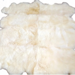 Eight stitched sheepskins, white
