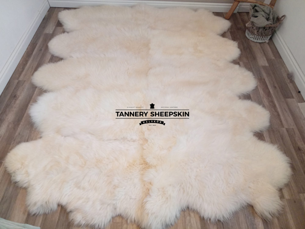 Tien gestikt leer in wit Schapenvachten Gestikt Producent owczych skór dekoracyjnych | Tannery Sheepskin | KalSkór 5